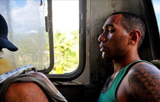 A portrait of my silent seatmate during 3-hour bus ride across the island of Vanua Levu from Labasa to Savusavu. The buses are ancient and break down often; frequent riders develop a deep-seated frustration with the bumpy 85 kilometer road that crosses the mountains that jut from the middle of the island. 

Cross-island road, Vanua Levu, Fiji.