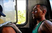 A portrait of my silent seatmate during 3-hour bus ride across the island of Vanua Levu from Labasa to Savusavu. The buses are ancient and break down often; frequent riders develop a deep-seated frustration with the bumpy 85 kilometer road that crosses the mountains that jut from the middle of the island. 

Cross-island road, Vanua Levu, Fiji.: by simtinger, Views[633]