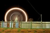A long exposure of the ferris wheel at Labasa's Festival of the Friendly North. This yearly festival draws tens of thousands  from all over the island of Vanua Levu, and the ensuing crowd is a racous blend of villagers and city-dwellers amongst the rides and food stalls. At the time the photo was taken Fiji was a military dictatorship and large, non-religious gatherings were outlawed, so state-sponsored events like this one gave locals the rare opportunity to congregate en masse. 

Labasa Town, Vanua Levu, Fiji. : by simtinger, Views[644]