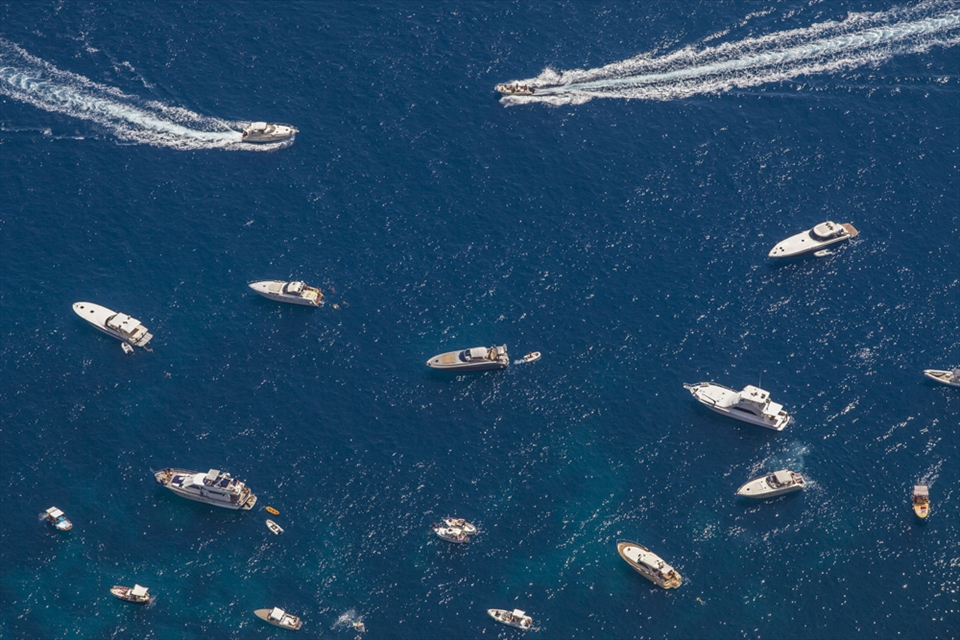 Boats queueing for entry to Capri's Blue Grotto seen from Mt. Solaro