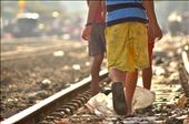 three children walking on the middle of rail,without scare the trains will pass.: by siscaangie, Views[531]