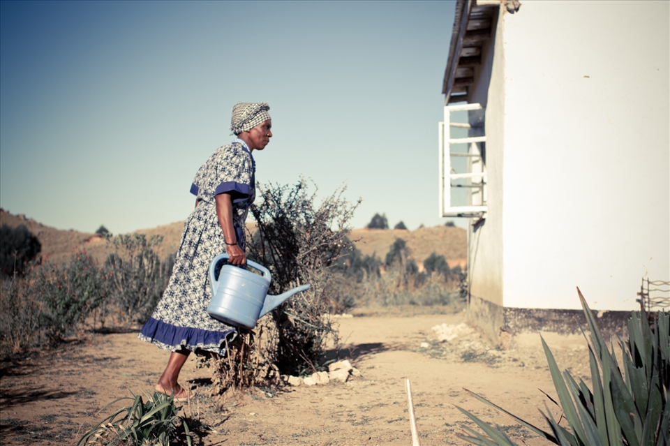 Gertie watering her flowers