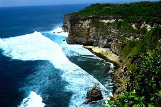 Uluwatu temple is located on a steep cliff 70 meters high as it has a very beautiful views of that can be seen from the west side of the temple. the view is the Pecatu beach. Pecatu beach has big waves, so it is suitable to be a place for tourists surfing sports.