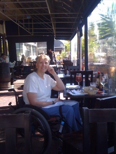 Denise at outdoor seating, La Boehme Bistro in Sea Point, suburb of Cape Town.  Nice Tapas.
