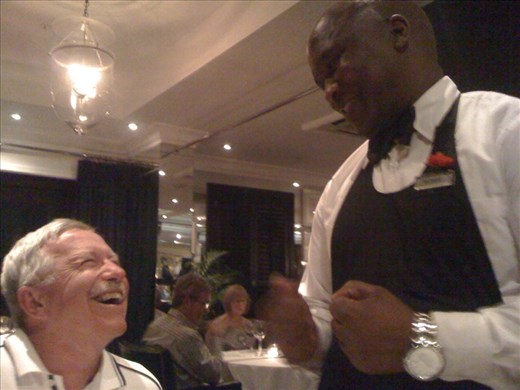 John and Sommelier Richard chat together.