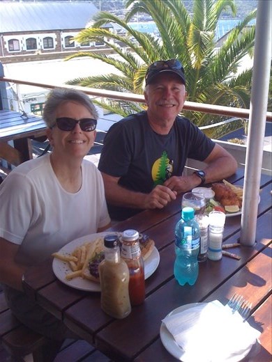 Late lunch of hake fish and chips for John and ostrich burger for Denise.  Little spot at the harbor at Simons Town on day's drive to Cape of Good Hope.