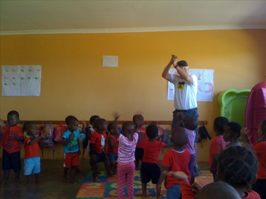 John teaching the 3year olds the Hokey Pokey.  They like it so much they wanted the words to use again.