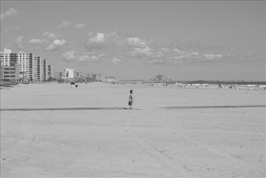 The beach is, in some ways, the end of the earth. Of course, being on the beach you know, looking at the ocean, that somewhere far away there is the other side of that ocean. But the ocean is so large. Standing in the sand, the horizon is however far away your eyes can manage to see. The beach can make you feel small in a way that only  can be mirrored by looking up at the stars on a clear night. 