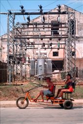A power grid as a backdrop to a common form of local transport- the small-engined tricycle buggy.: by sneaky_k, Views[536]
