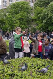 Paris is the city of lights, the city de l'amour.  It is also the city where children feeding the pigeons can teach us that each moment should be cherished as it is special and has a story to tell.: by snewman, Views[366]