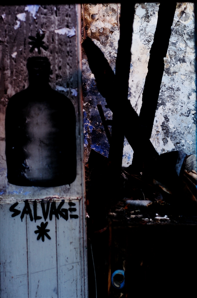 She also has a camera, and starts taking pictures of me. We kinda play around and I'm happy to see her cheering up a little bit. She liked the pictures and accepted to let me show a bribe of herself.
I will remember Alice, her beauty and her strength, after this moment we shared.
I left the spot and shot this wall, meaningful after this meeting, removed the heavy fucked up door and got back into busy streets with another dynamic, another rhythm, just back to a parallell reality, like this meeting never happened. Except  my eyes were more open after what Alice gave to me, being the incarnation of the famous saying 