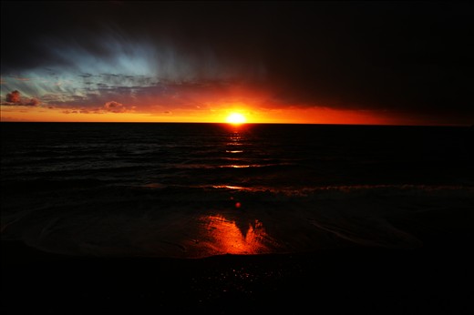 A breathtaking sunset before a storm darkens the sky. Levanto, Italy