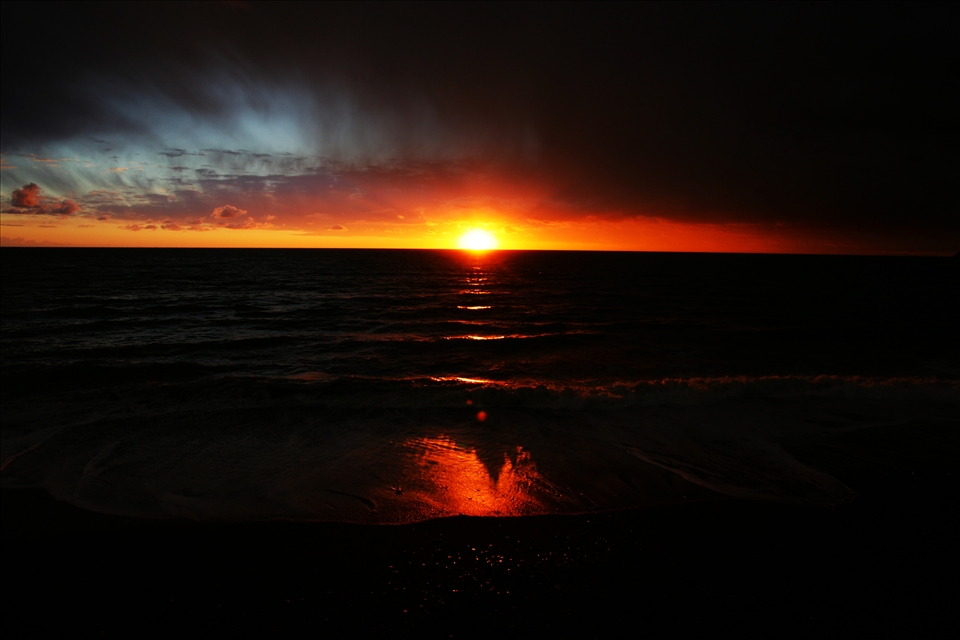 A breathtaking sunset before a storm darkens the sky. Levanto, Italy