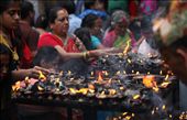 Women light candles during Janai Purnima celebrations, a festival in which women pray for their brothers' and husbands' well-being.: by sofagis, Views[945]