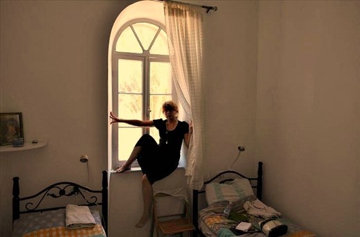 A self-portrait in the eerie monastery room I stayed in. 