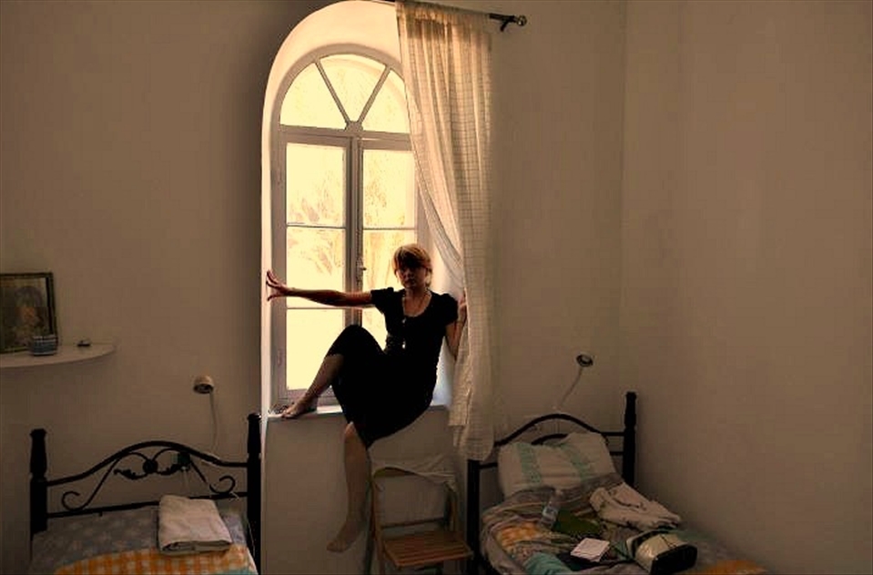 A self-portrait in the eerie monastery room I stayed in. 