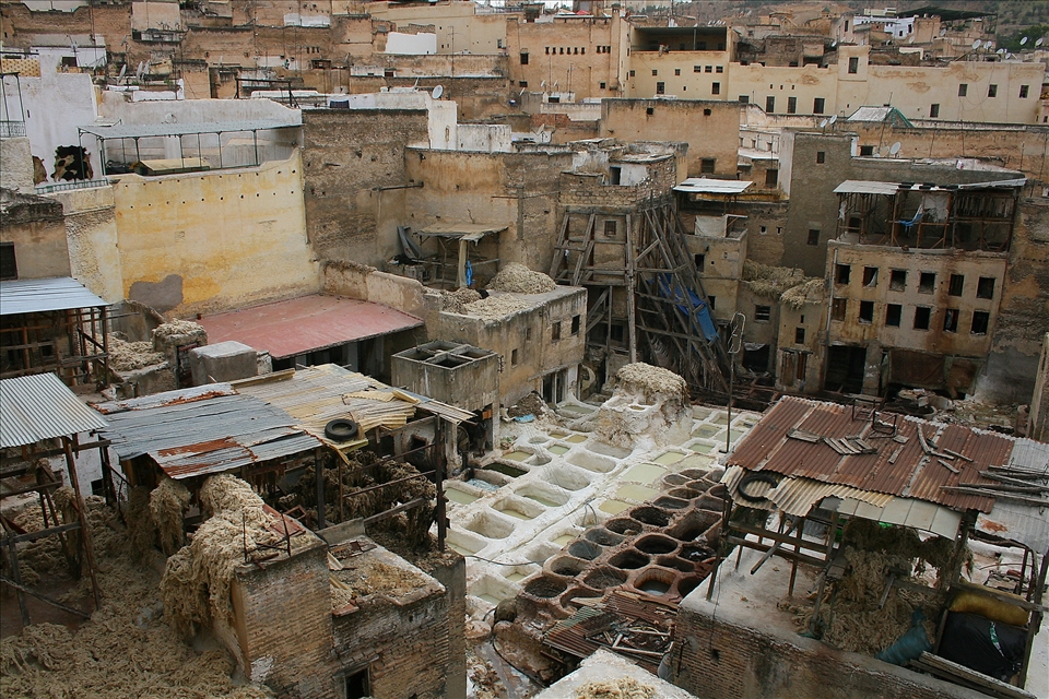 The oldest leather tannery in the world, in the labyrinth of Fez Medina. Fez found in the foothills of the North middle Atlas Mountains of Morocco. Balconies and rooftops, give a great opportunity to take your perfect picture. That is from where I took this photograph. This is usually a place which is always occupied by many workers, and always seem to be hectic and loud. That day I had the chance to take a picture of the mystical side of it, frozen and peacefully quiet - just magical. 