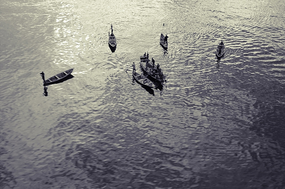 Fishermen at dawn over Lake Tanganyika