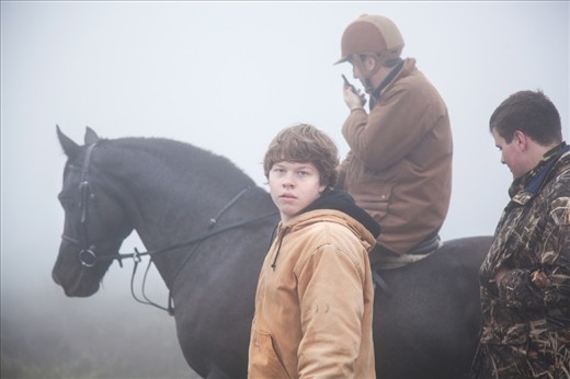David Wallace and his son search through the fog for their herd. They comb the 10 square mile stretch on horseback, quadbike and on foot until they find and can push the wild ponies towards their farm.