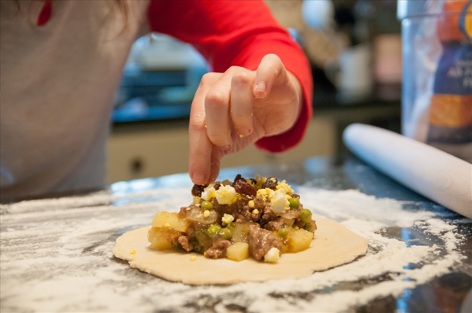 Adding filling and toppings to the middle of the dough
