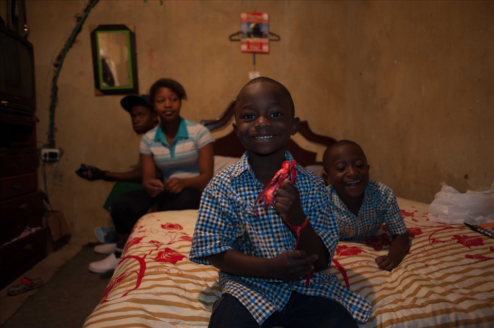 Introducing Yhuliam, getting ready to open his Christmas present.