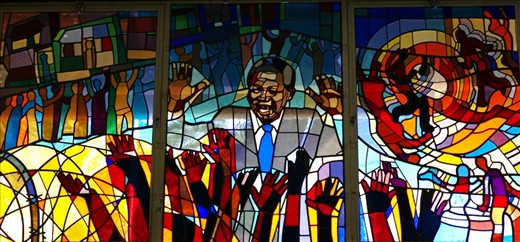 A leadlight window in Regina Mundi Church, depicts the strong support for Nelson Mandela by his people.