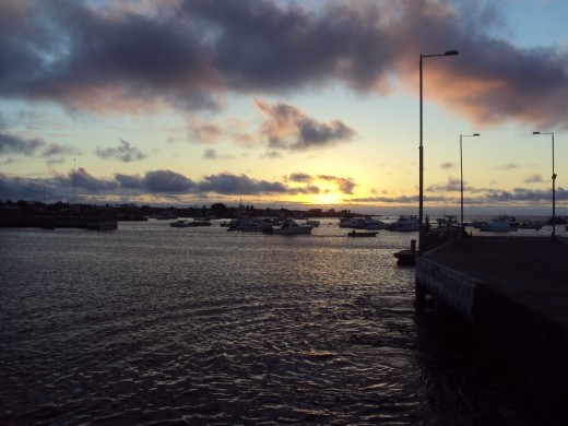 Sunset over the harbour. San Cristobal Island. 