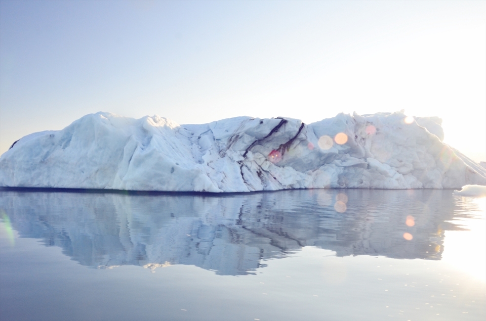 One of the primary reasons I wanted to go to Iceland was to visit Jokulsarlon Glacier Lagoon, and it did not disappoint. I did a zodiac tour in the lagoon to get  up close and personal with the icebergs. The sun was setting as the boat headed back in to dock, and I shot this pic just as the lagoon started to flatten out.