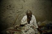 Edmond lives alone in a mud hut that gets destroyed every rainy season.: by spicyindian, Views[535]