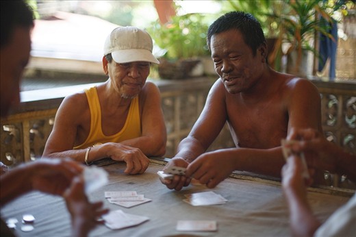 Although cured, these lepers are unable to work because of their disabilities. With out family members nearby they pass the time by playing cards among themselves and sometimes small talk with tourists who actually want to ineract with them. They say, seldom do people actually come close and talk with them, they were very pleased that I did.