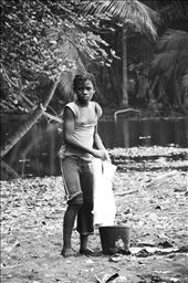 A beautiful girl are cleaning clothes in the beach: by spiritrituals, Views[303]