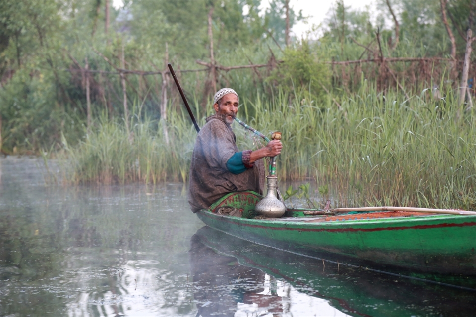 After exchange the goods in the morning market the old man is relaxing himself by take a ‘Baraku’ that is the most popular tobacco in Kashmir.