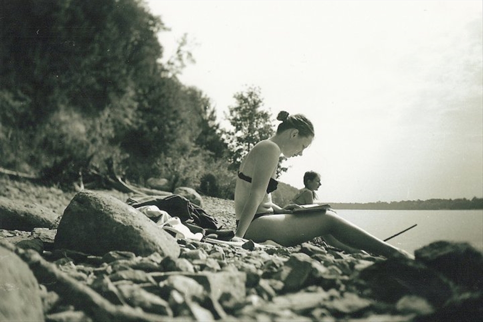 These places along the line of riverbank usually are under the water, both because of the seasonal tide as well as because of the hydro-power station built in 1960s for generating power for electric railway system. So, youngsters are seizing the moment when it's possible to climb down and enjoy a relaxing moment right at the waters.