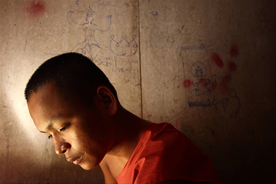 potrait of a young monk. This young monk sent by their family to study. They have to life in shrine for 3-5 years. After that they freely to choose life as a monk or married in their hometown