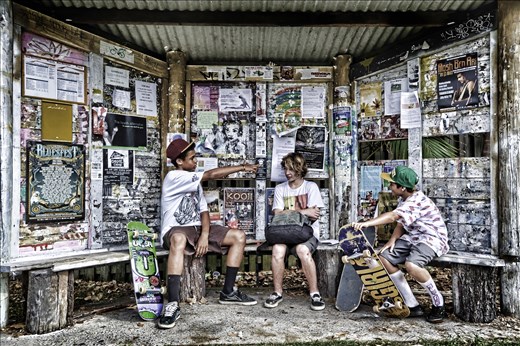 Kids waiting at the bus stop in Byron Bay, 