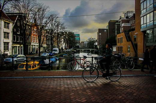 The photo shows the usual daily life in Amsterdam, Netherlands.