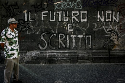The photo has been taken in Napoli, Italy. Since Napoli doesn't have a good reputation in Italy and with the high unemployment rate people are having difficulties to see their future. And also there is a high impact of mafia. In this picture, the writing says 