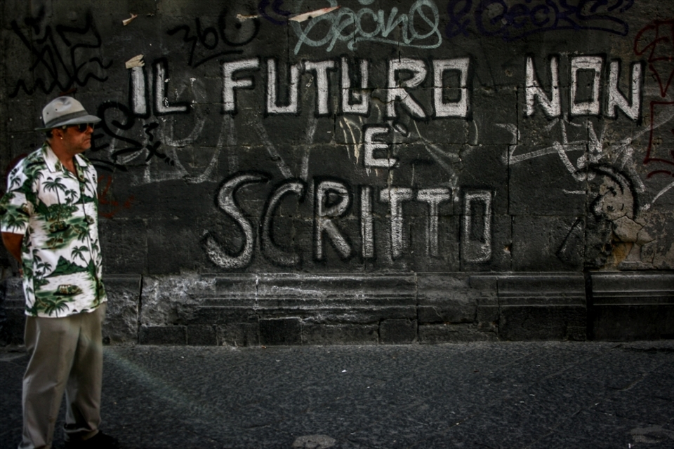 The photo has been taken in Napoli, Italy. Since Napoli doesn't have a good reputation in Italy and with the high unemployment rate people are having difficulties to see their future. And also there is a high impact of mafia. In this picture, the writing says 