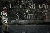 The photo has been taken in Napoli, Italy. Since Napoli doesn't have a good reputation in Italy and with the high unemployment rate people are having difficulties to see their future. And also there is a high impact of mafia. In this picture, the writing says 