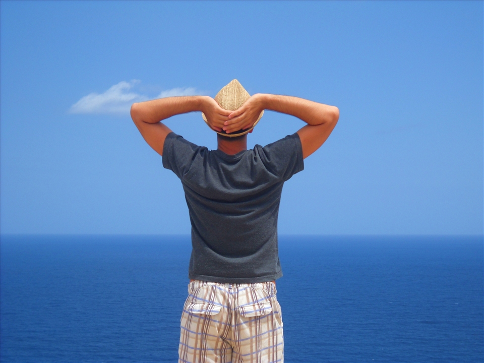 Standing on an edge of a cliff