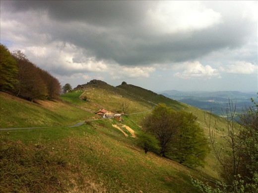 Halfway to the heights of the Col de Lepoeder is the only “albergue” along this path to Roncesvalles.  Passing it by to continue straight through to Roncesvalles and looking back, you can see the valley you’ve ascended from far below.  Spain is not far away, now.