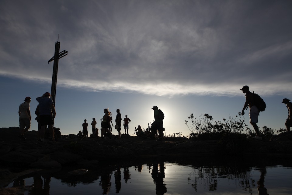 Tourist gather at sunset on top a mountain in Chapada Diamantina National Park.