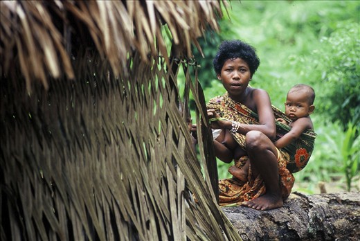 A mother and her child deep in the rain forest of Taman Negara National Park