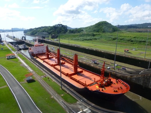 A bulk ship entering Miraflres Lock.