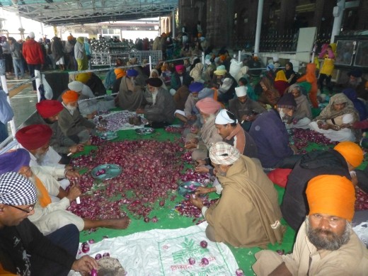 They feed about 100,000 people a day at the temple. This is just the onion chopping area!