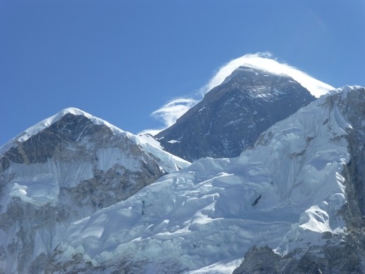 The mighty mount Everest poking over the ridge.