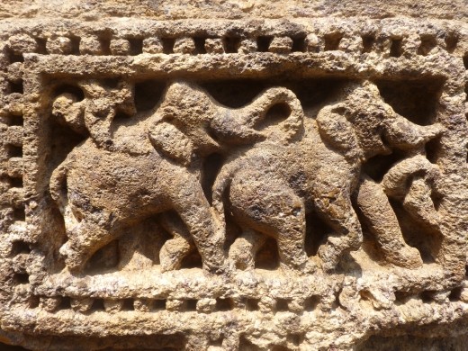 The temple is covered with intricate carvings.