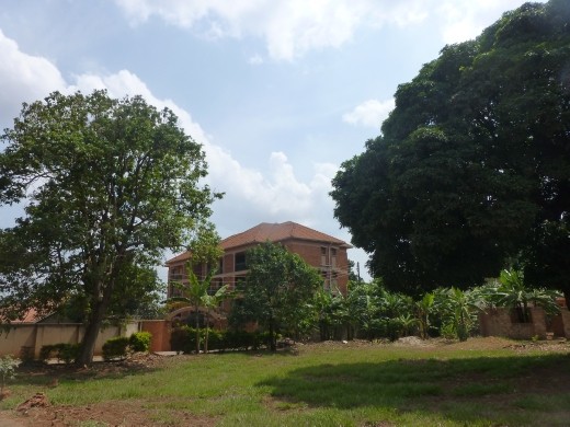 Approaching the apartment block down the lane by the fish stall.