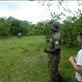 The big male rhino took a close interest in us too, so we hid behind a tree! Views[257]