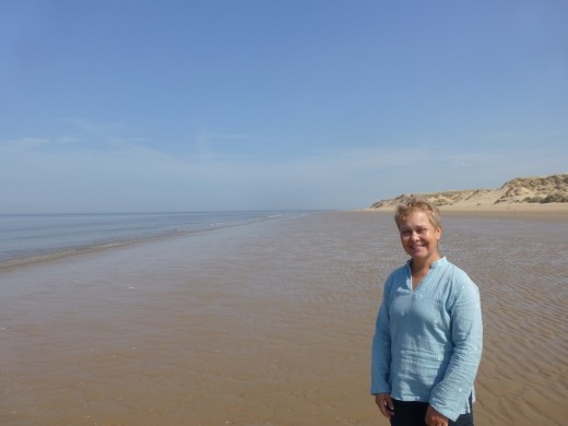 Emma recovering from the wedding on Formby beach.